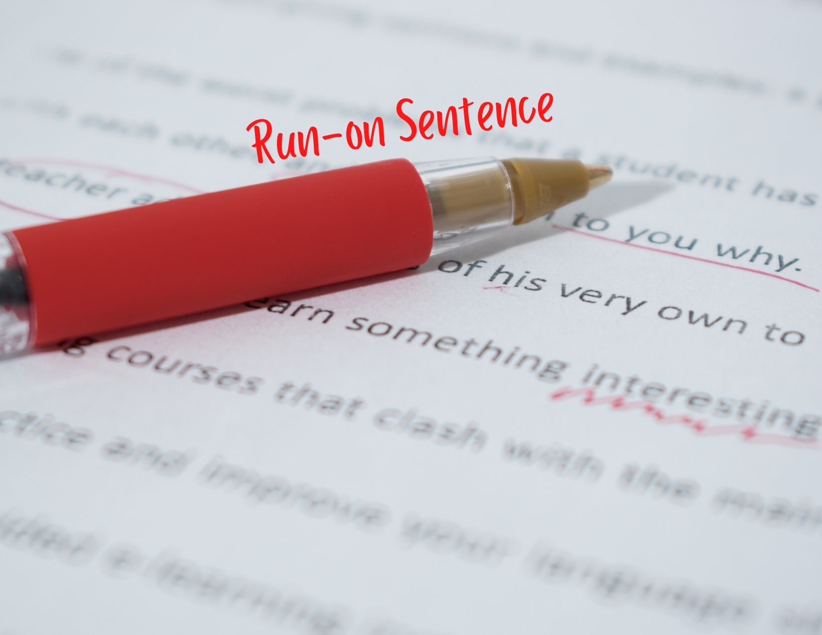 A graphic of a paper, a red pen and the words "run-on sentence"