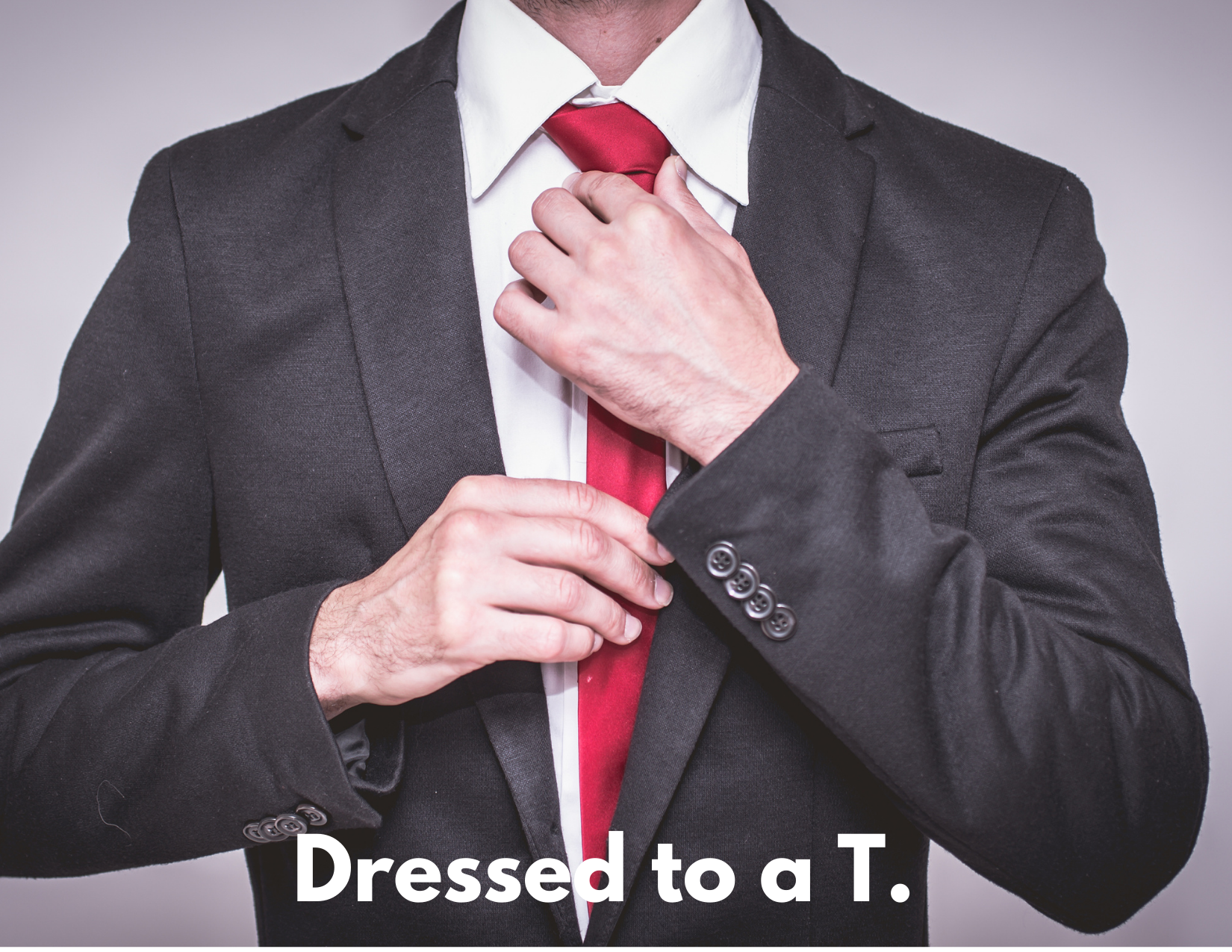 A picture of a well dressed man adjusting his tie with the caption "Dressed to a T"