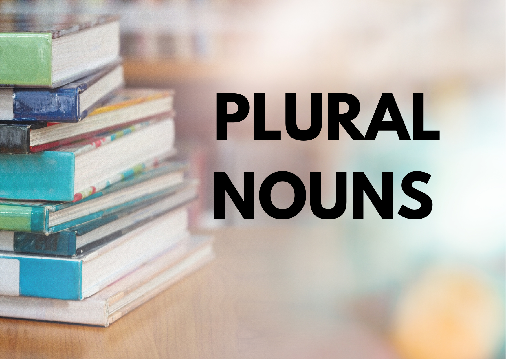 A blurred background of books with the words Plural Nouns