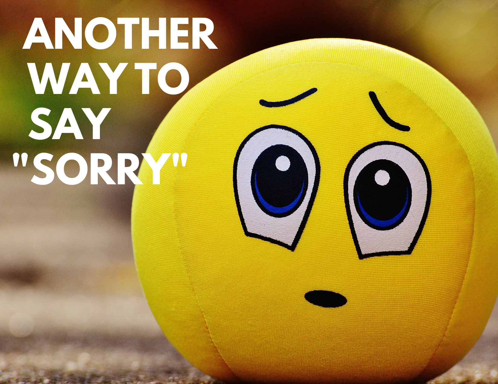 another way to say sorry caption over a graphic of a tennis ball with a facial expression of remorse